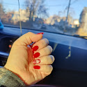 Red and white patterned nail art