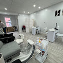 Bright manicure stations inside Savannah Nails and Spa