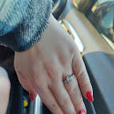 Glossy red manicure on almond-shaped nails