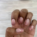 Rose-pink glitter manicure on short rounded nails